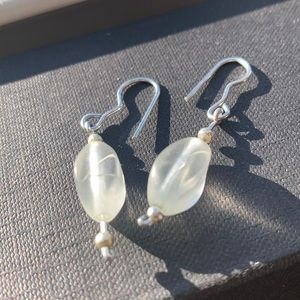 Beautiful dangle earrings with glass bead